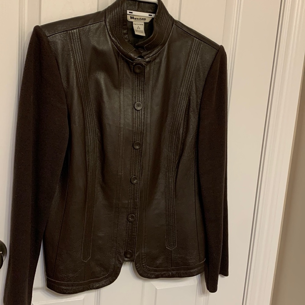 Leather front with sweater rule sleeves and back jacket